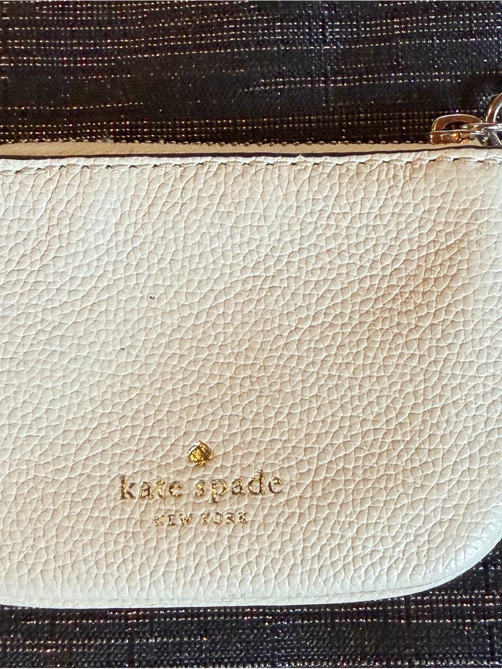 Kate Spade cream pebbled leather zip pouch with gold details